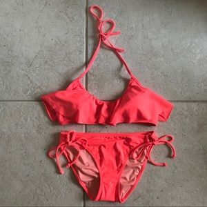 Victoria’s Secret Orange ruffle bikini.